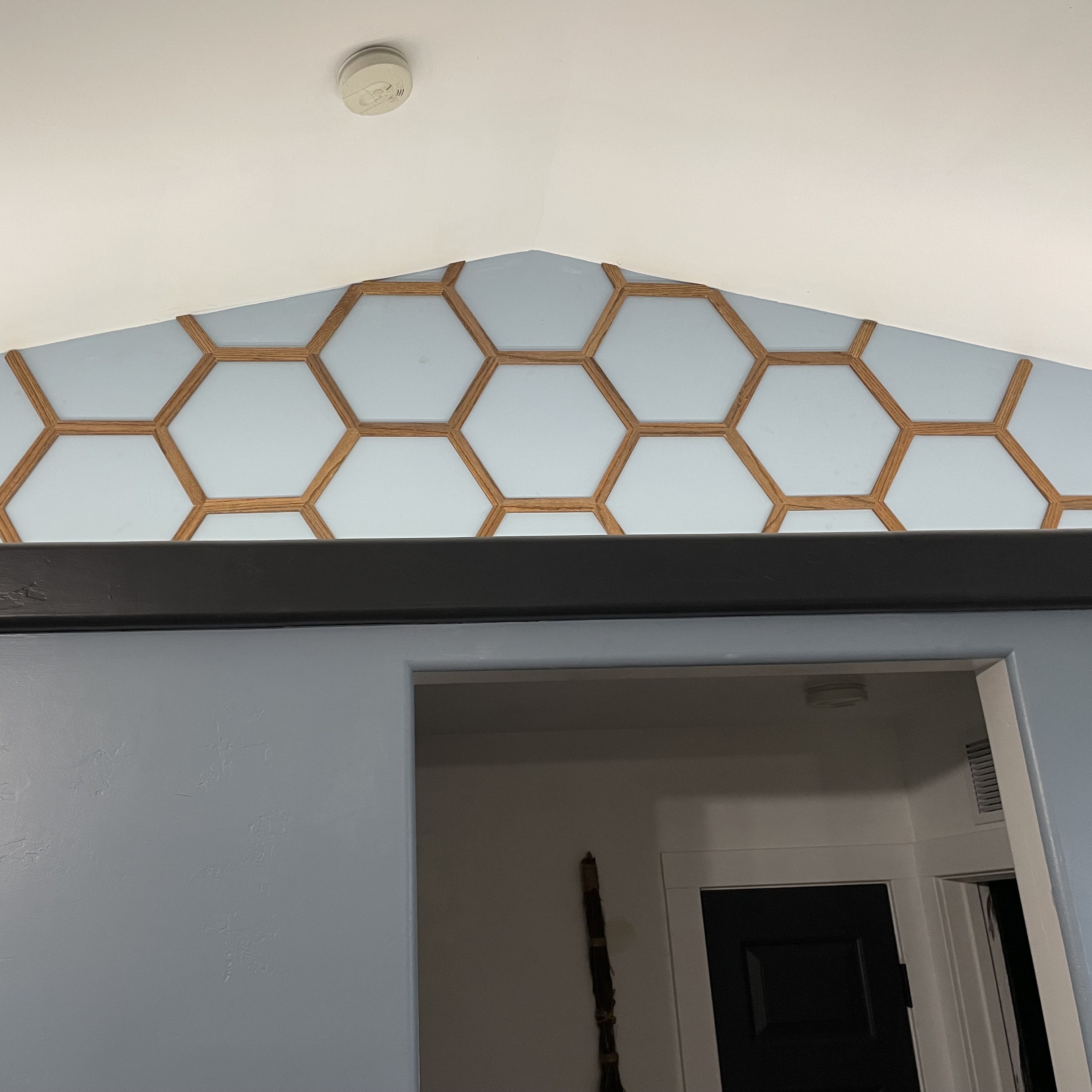Custom Accent Wall with decorations and bold colors.