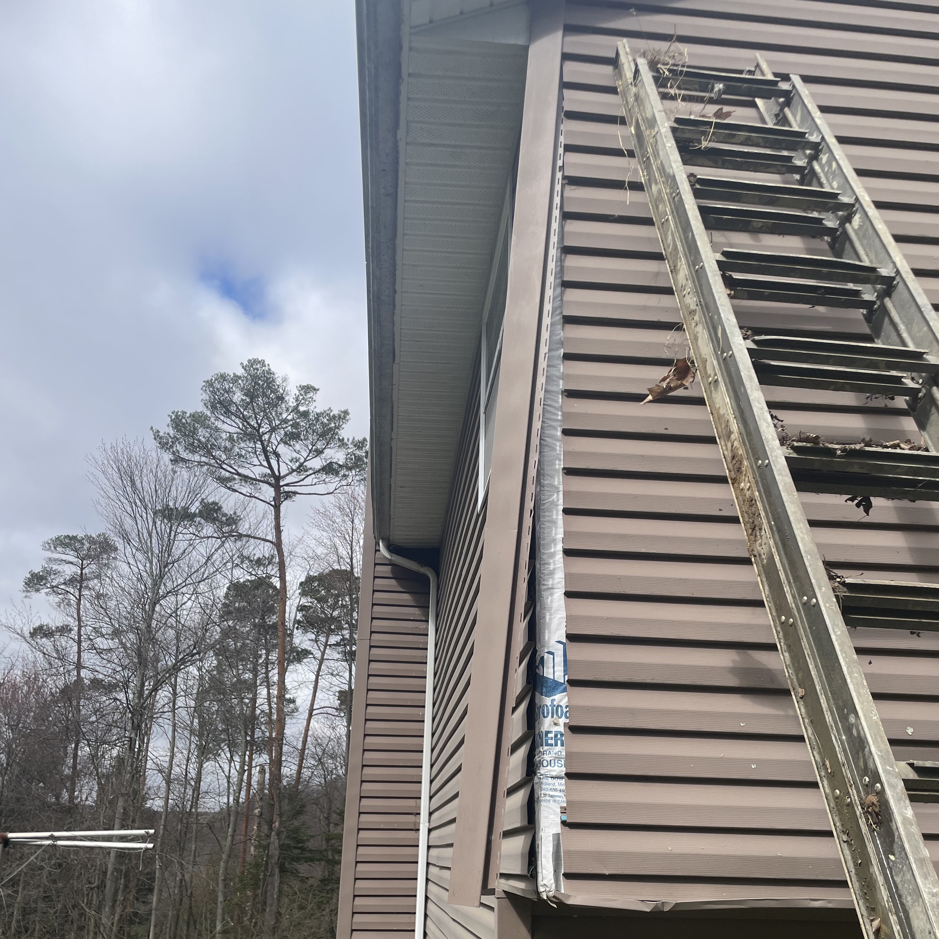 Vynil siding repairs before and after